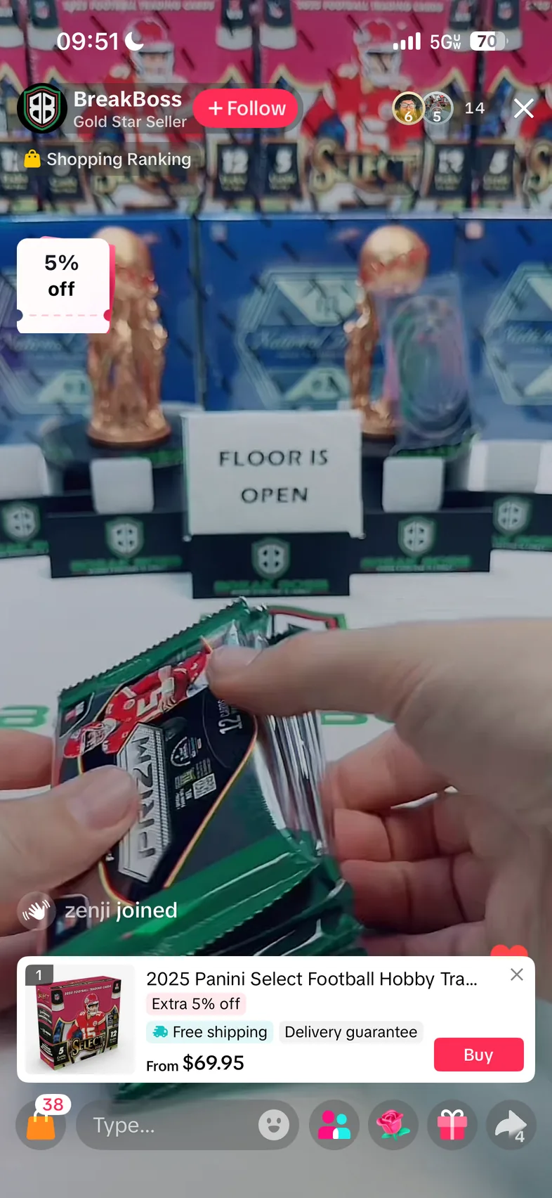 A TikTok Shop livestream selling sealed 2025 Panini Select football boxes, with a five percent off coupon tile in the upper left and the pinned product card along the bottom